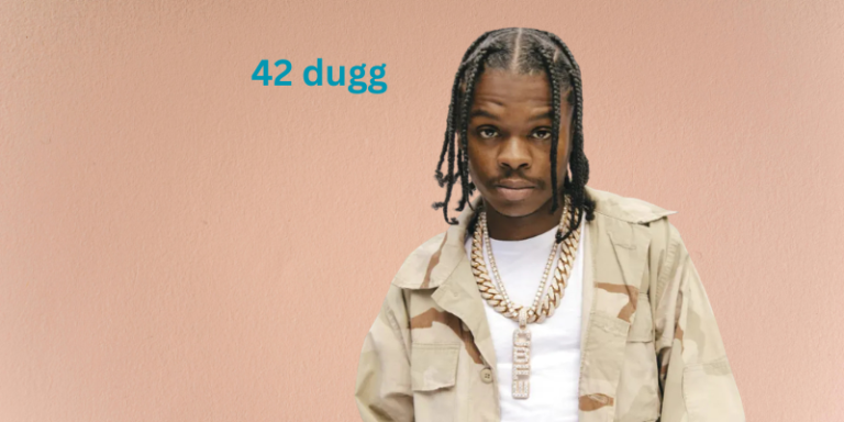 Portrait of 42 Dugg wearing stylish streetwear and jewelry, looking confidently at the camera, reflecting his bold hip-hop persona.
