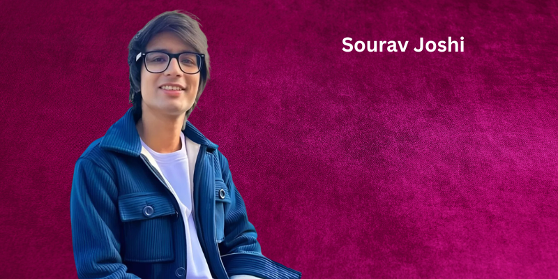 Sourav Joshi, a popular Indian YouTuber and vlogger, smiling in a casual setting, known for his daily vlogs and artistic content.